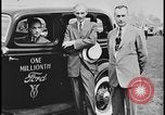 Image of Henry Ford with 1930's Ford sedans Dearborn Michigan USA, 1935, second 24 stock footage video 65675078249