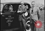 Image of Henry Ford with 1930's Ford sedans Dearborn Michigan USA, 1935, second 25 stock footage video 65675078249