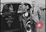 Image of Henry Ford with 1930's Ford sedans Dearborn Michigan USA, 1935, second 26 stock footage video 65675078249