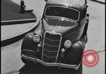 Image of Henry Ford with 1930's Ford sedans Dearborn Michigan USA, 1935, second 27 stock footage video 65675078249