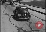 Image of Henry Ford with 1930's Ford sedans Dearborn Michigan USA, 1935, second 31 stock footage video 65675078249