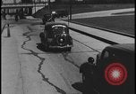 Image of Henry Ford with 1930's Ford sedans Dearborn Michigan USA, 1935, second 32 stock footage video 65675078249