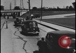 Image of Henry Ford with 1930's Ford sedans Dearborn Michigan USA, 1935, second 34 stock footage video 65675078249