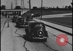 Image of Henry Ford with 1930's Ford sedans Dearborn Michigan USA, 1935, second 35 stock footage video 65675078249