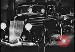 Image of Henry Ford with 1930's Ford sedans Dearborn Michigan USA, 1935, second 45 stock footage video 65675078249