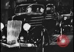 Image of Henry Ford with 1930's Ford sedans Dearborn Michigan USA, 1935, second 49 stock footage video 65675078249