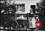 Image of Dutch woman with milk cart pulled by dog Dearborn Michigan USA, 1935, second 3 stock footage video 65675078255