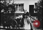 Image of Dutch woman with milk cart pulled by dog Dearborn Michigan USA, 1935, second 4 stock footage video 65675078255