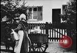 Image of Dutch woman with milk cart pulled by dog Dearborn Michigan USA, 1935, second 5 stock footage video 65675078255