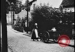 Image of Dutch woman with milk cart pulled by dog Dearborn Michigan USA, 1935, second 14 stock footage video 65675078255