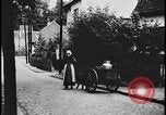 Image of Dutch woman with milk cart pulled by dog Dearborn Michigan USA, 1935, second 15 stock footage video 65675078255