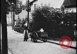 Image of Dutch woman with milk cart pulled by dog Dearborn Michigan USA, 1935, second 16 stock footage video 65675078255