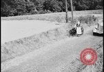 Image of Dutch woman with milk cart pulled by dog Dearborn Michigan USA, 1935, second 24 stock footage video 65675078255