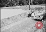 Image of Dutch woman with milk cart pulled by dog Dearborn Michigan USA, 1935, second 25 stock footage video 65675078255