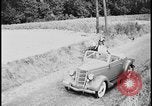 Image of Dutch woman with milk cart pulled by dog Dearborn Michigan USA, 1935, second 26 stock footage video 65675078255