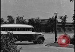 Image of Young men and women punch  time clock at Ford facility Dearborn Michigan  USA, 1938, second 1 stock footage video 65675078259