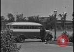 Image of Young men and women punch  time clock at Ford facility Dearborn Michigan  USA, 1938, second 4 stock footage video 65675078259