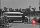 Image of Young men and women punch  time clock at Ford facility Dearborn Michigan  USA, 1938, second 5 stock footage video 65675078259