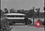 Image of Young men and women punch  time clock at Ford facility Dearborn Michigan  USA, 1938, second 6 stock footage video 65675078259