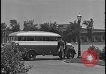 Image of Young men and women punch  time clock at Ford facility Dearborn Michigan  USA, 1938, second 8 stock footage video 65675078259