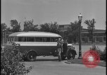 Image of Young men and women punch  time clock at Ford facility Dearborn Michigan  USA, 1938, second 9 stock footage video 65675078259