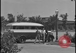 Image of Young men and women punch  time clock at Ford facility Dearborn Michigan  USA, 1938, second 10 stock footage video 65675078259