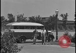 Image of Young men and women punch  time clock at Ford facility Dearborn Michigan  USA, 1938, second 11 stock footage video 65675078259