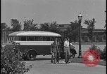 Image of Young men and women punch  time clock at Ford facility Dearborn Michigan  USA, 1938, second 12 stock footage video 65675078259