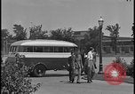 Image of Young men and women punch  time clock at Ford facility Dearborn Michigan  USA, 1938, second 13 stock footage video 65675078259