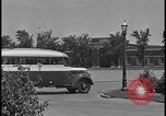 Image of Young men and women punch  time clock at Ford facility Dearborn Michigan  USA, 1938, second 18 stock footage video 65675078259