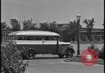 Image of Young men and women punch  time clock at Ford facility Dearborn Michigan  USA, 1938, second 20 stock footage video 65675078259
