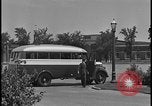 Image of Young men and women punch  time clock at Ford facility Dearborn Michigan  USA, 1938, second 24 stock footage video 65675078259