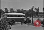 Image of Young men and women punch  time clock at Ford facility Dearborn Michigan  USA, 1938, second 25 stock footage video 65675078259