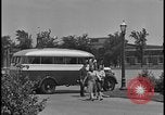 Image of Young men and women punch  time clock at Ford facility Dearborn Michigan  USA, 1938, second 29 stock footage video 65675078259