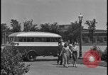 Image of Young men and women punch  time clock at Ford facility Dearborn Michigan  USA, 1938, second 30 stock footage video 65675078259