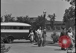 Image of Young men and women punch  time clock at Ford facility Dearborn Michigan  USA, 1938, second 33 stock footage video 65675078259