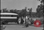 Image of Young men and women punch  time clock at Ford facility Dearborn Michigan  USA, 1938, second 34 stock footage video 65675078259