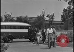 Image of Young men and women punch  time clock at Ford facility Dearborn Michigan  USA, 1938, second 35 stock footage video 65675078259
