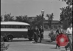 Image of Young men and women punch  time clock at Ford facility Dearborn Michigan  USA, 1938, second 37 stock footage video 65675078259