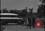 Image of Young men and women punch  time clock at Ford facility Dearborn Michigan  USA, 1938, second 39 stock footage video 65675078259