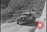 Image of Ford cars being tested in rugged conditions United States USA, 1932, second 5 stock footage video 65675078263
