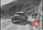 Image of Ford cars being tested in rugged conditions United States USA, 1932, second 7 stock footage video 65675078263