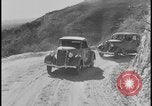 Image of Ford cars being tested in rugged conditions United States USA, 1932, second 8 stock footage video 65675078263