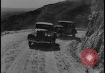 Image of Ford cars being tested in rugged conditions United States USA, 1932, second 9 stock footage video 65675078263