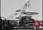 Image of ship hull pieces flattened for recycling into cars Dearborn Michigan USA, 1928, second 10 stock footage video 65675078285