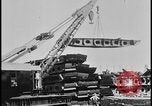 Image of ship hull pieces flattened for recycling into cars Dearborn Michigan USA, 1928, second 14 stock footage video 65675078285