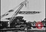 Image of ship hull pieces flattened for recycling into cars Dearborn Michigan USA, 1928, second 15 stock footage video 65675078285