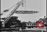 Image of ship hull pieces flattened for recycling into cars Dearborn Michigan USA, 1928, second 17 stock footage video 65675078285