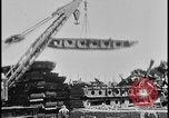 Image of ship hull pieces flattened for recycling into cars Dearborn Michigan USA, 1928, second 18 stock footage video 65675078285