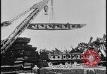 Image of ship hull pieces flattened for recycling into cars Dearborn Michigan USA, 1928, second 19 stock footage video 65675078285